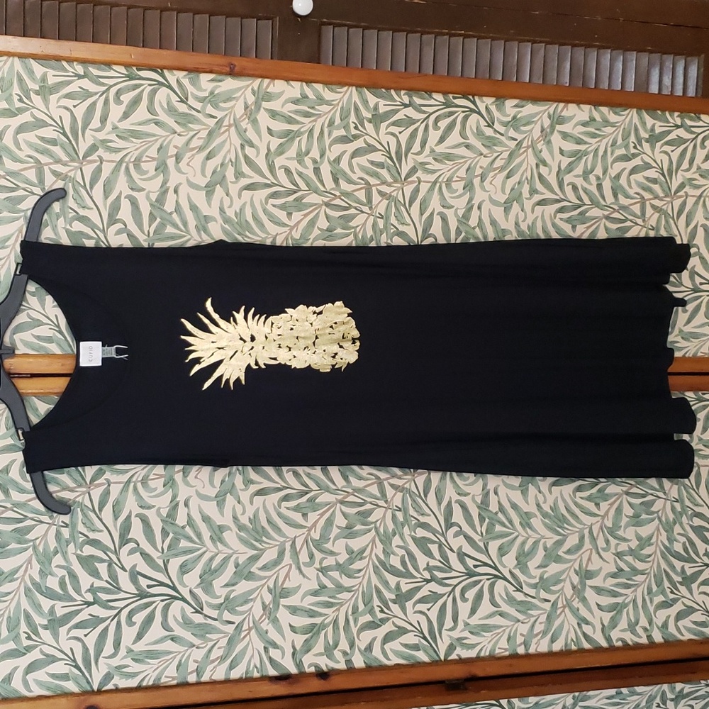 Casual black shift dress with gold pineapple print. Cupio. Has pockets